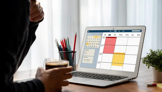 Laptop displaying a daily activity calendar with productive and inactive periods