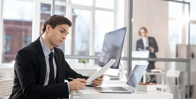 Administrator configuring workforce settings at a workstation