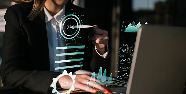 Analyst viewing a role-scoped analytics dashboard on a laptop