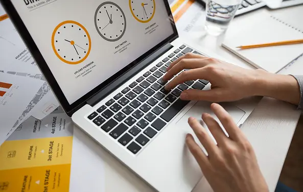 Laptop quietly tracking work activity in the background